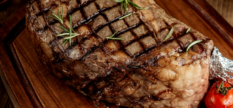 Grilled ribeye steak with rosemary